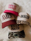 Howdy honey, keep prayin, amen, darlin’ trucker hats